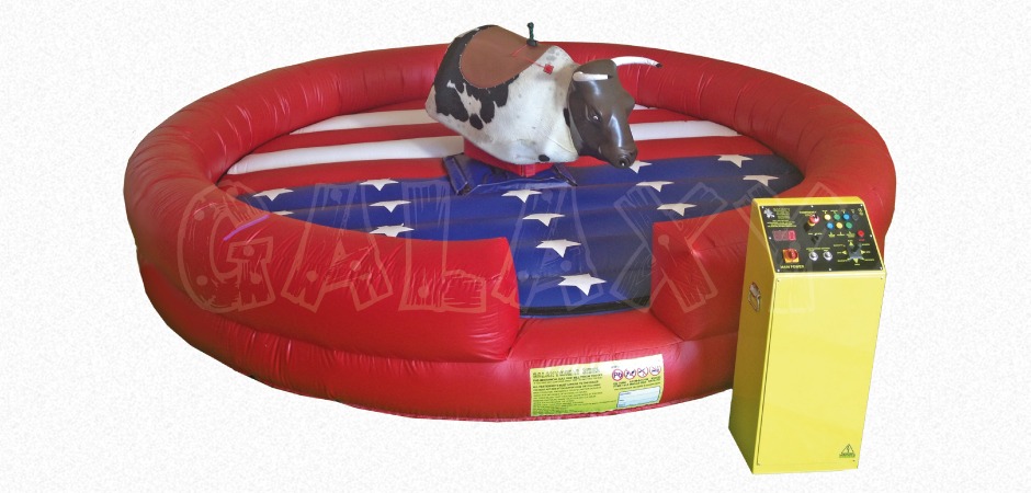 Patriotic mechanical bull rental with inflated landing